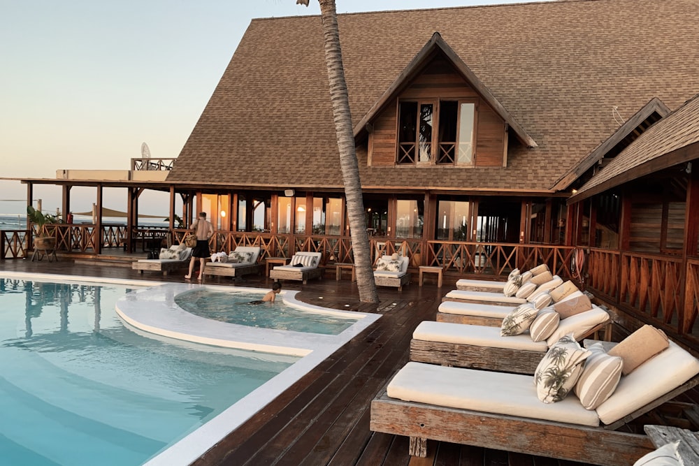 Beachfront Bali resort villa with a private pool and loungers